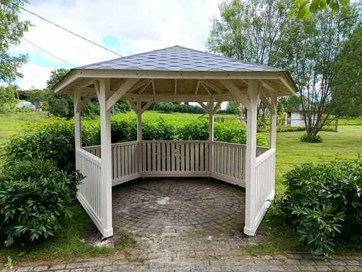 Six-sided wooden gazebo — cozy garden gazebo with floor and covered roof